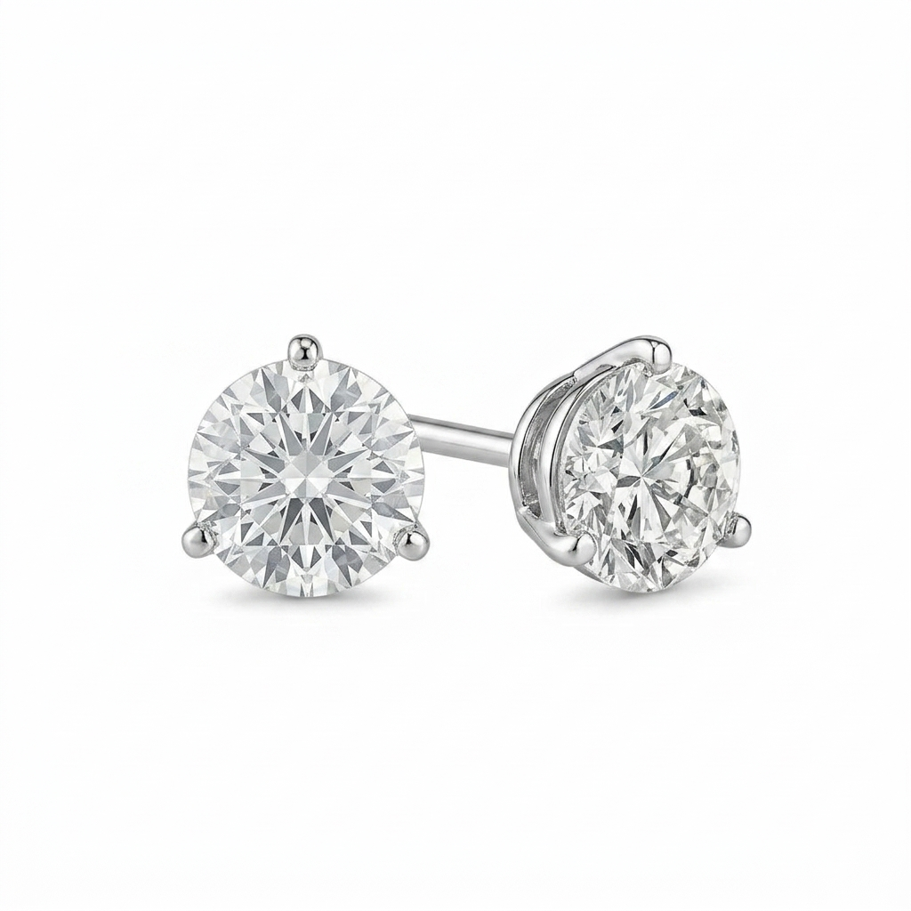 alt="front view of lab grown round cut diamond three prong stud earring in 14K white gold"