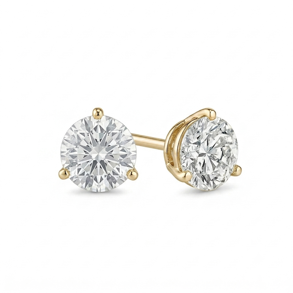 alt="front view of lab grown round cut diamond three prong stud earring in 14K yellow gold"