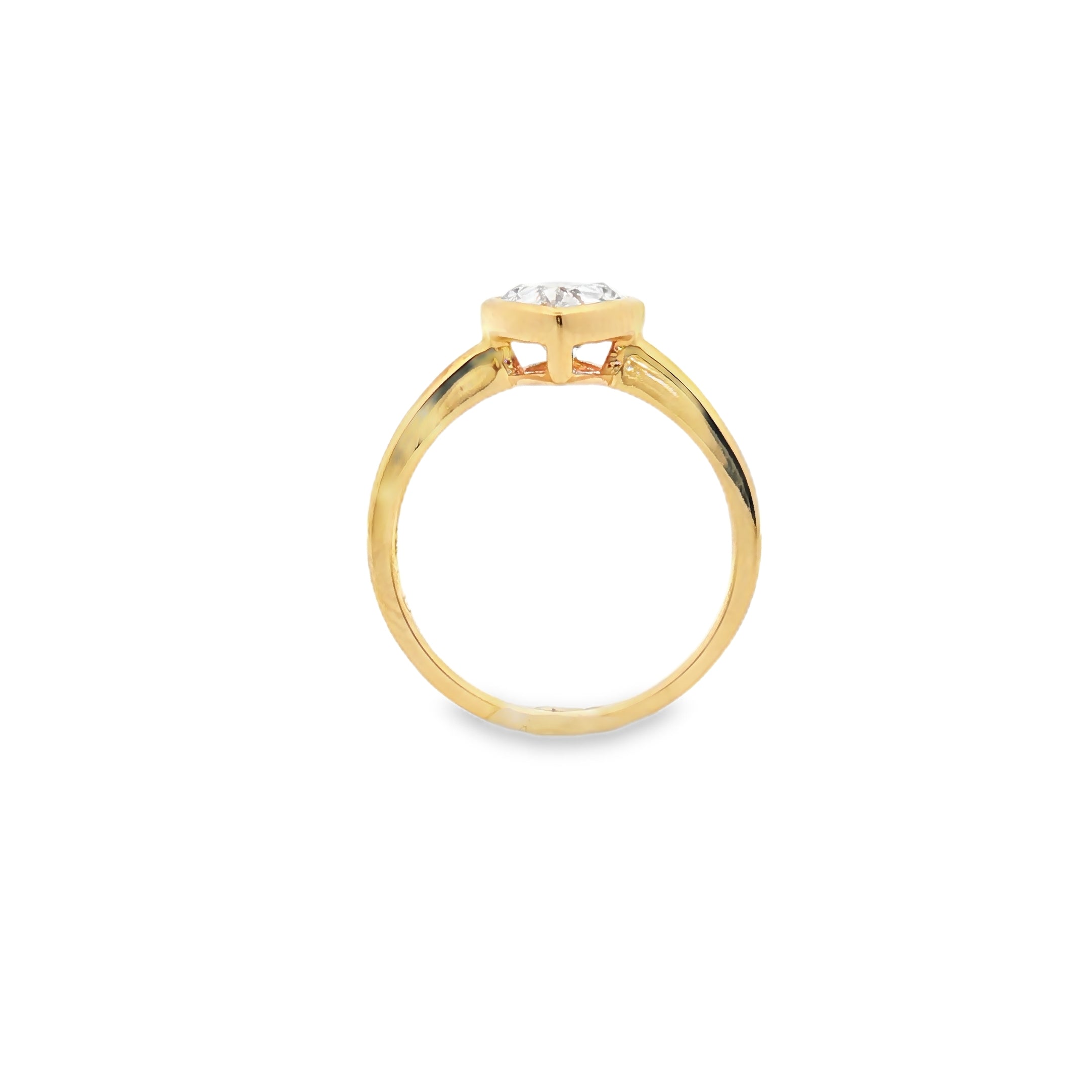 alt="profile view of lab grown pear cut diamond bezel set engagement ring in 14K yellow gold"