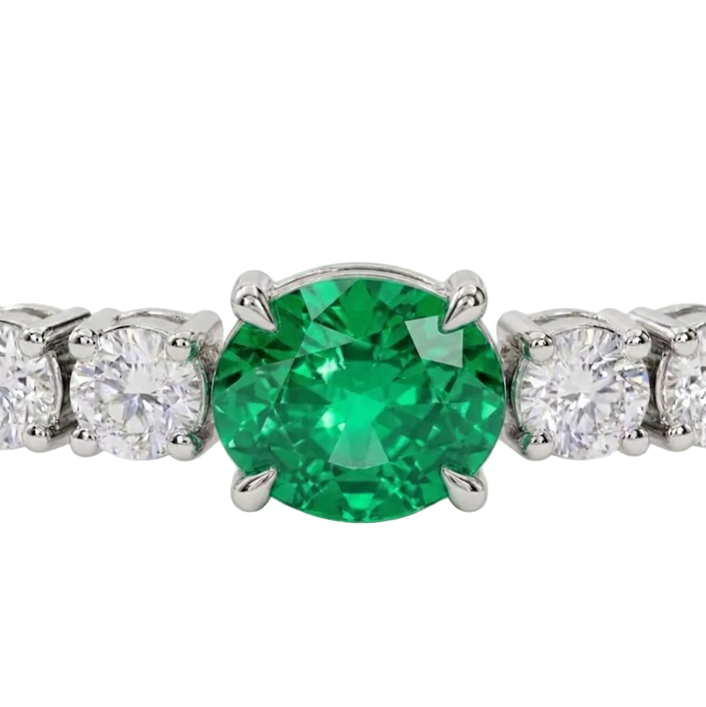 alt="close up view of lab grown oval columbian green emerald and round diamond east-west tennis bracelet in 14k white gold"