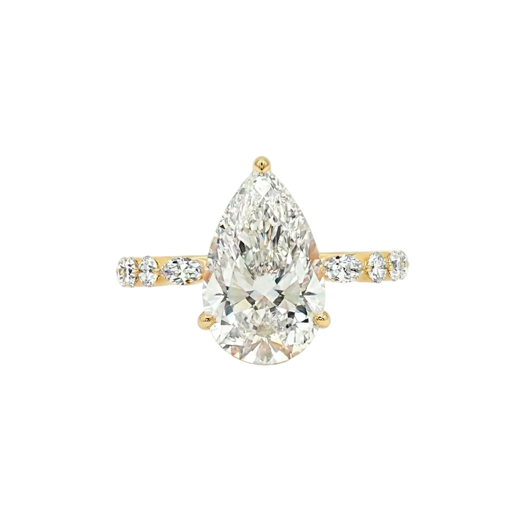alt="front view lab grown diamond pear cut ring 14K yellow gold"