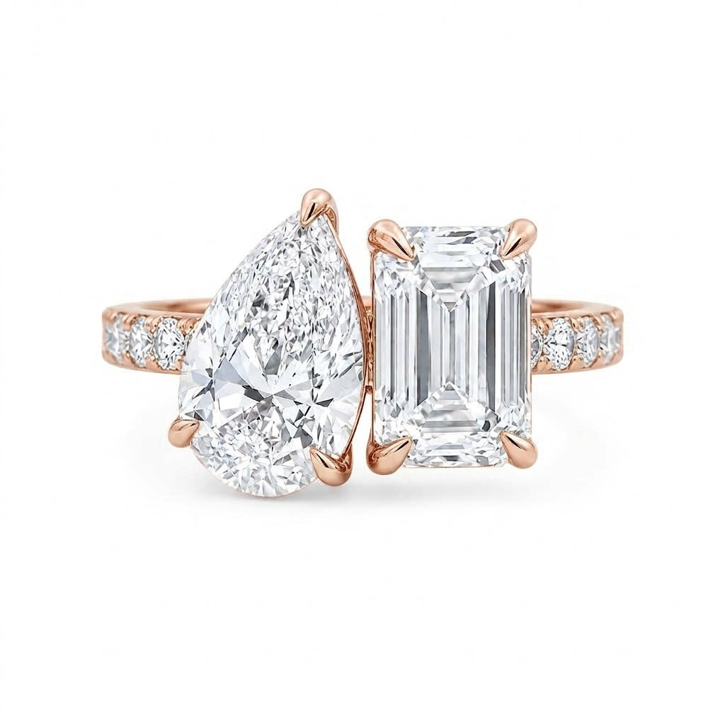 alt="front view lab grown diamond toi et moi ring 14K rose gold"