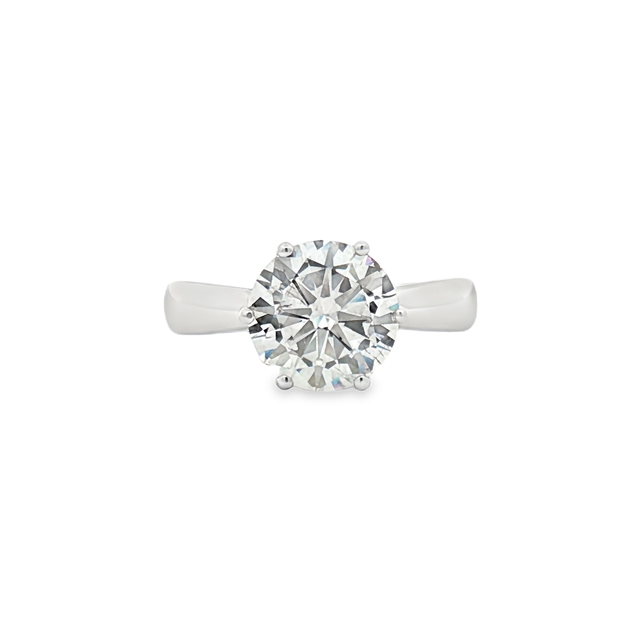 alt="front view of lab grown round cut diamond four prong setting solitaire engagement ring in 14K white gold"