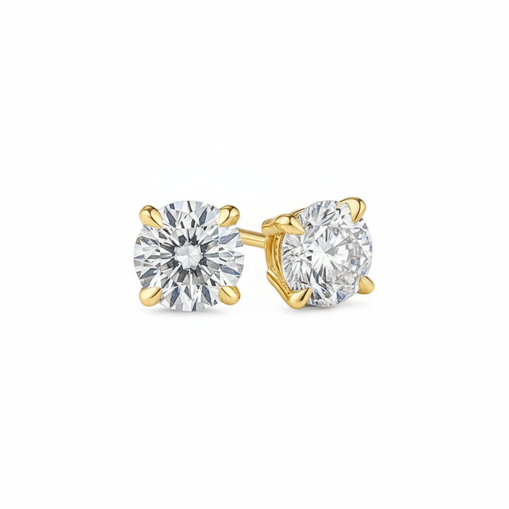 alt="front view of lab grown round cut diamond four prong stud earring in 14K yellow gold"