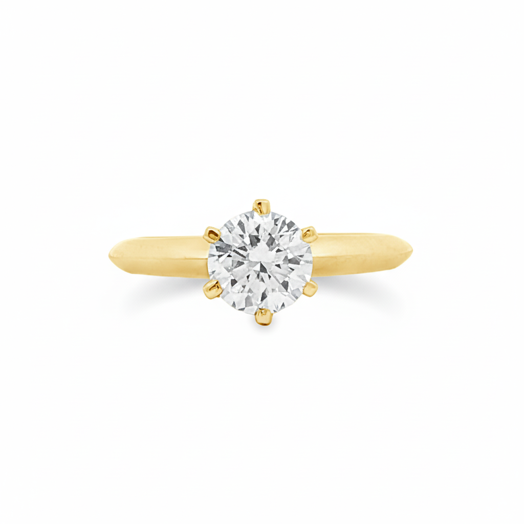 alt="front view of lab grown round cut diamond six prong setting solitaire engagement ring in 14K yellow gold"