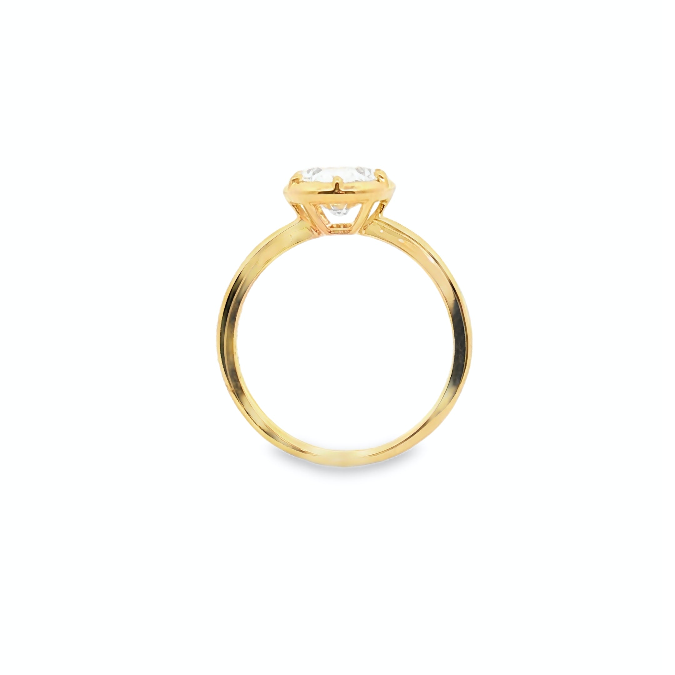 alt="profile view of lab grown oval cut diamond bezel set engagement ring in 14K yellow gold"