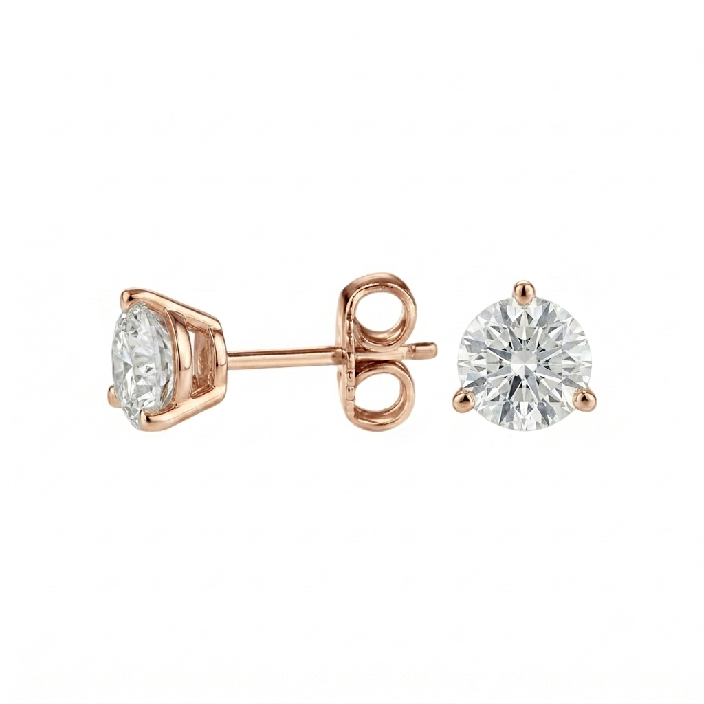 alt="side view of lab grown round cut diamond three prong stud earring in 14K rose gold"
